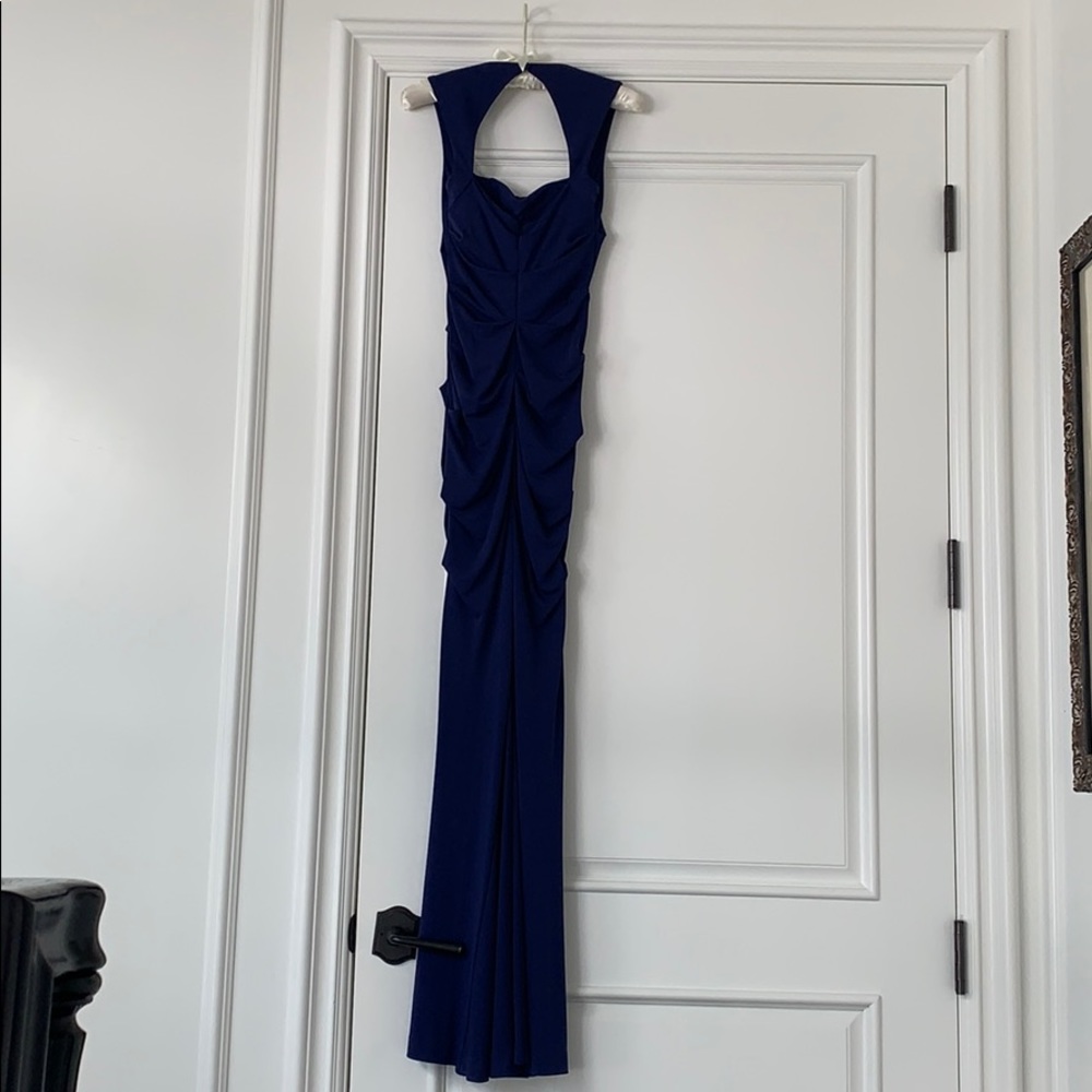 A long  Nicole Miller evening gown .